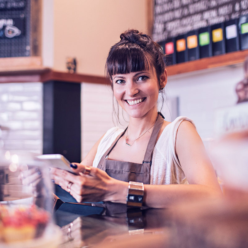 Cafe owner easily accessing her HR resources from her tablet
